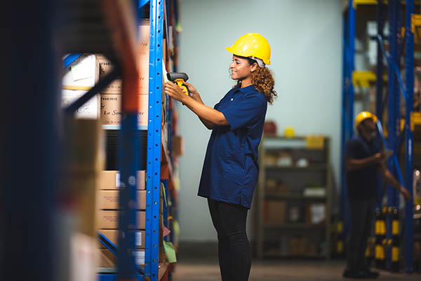 Warehouse worker scanning products